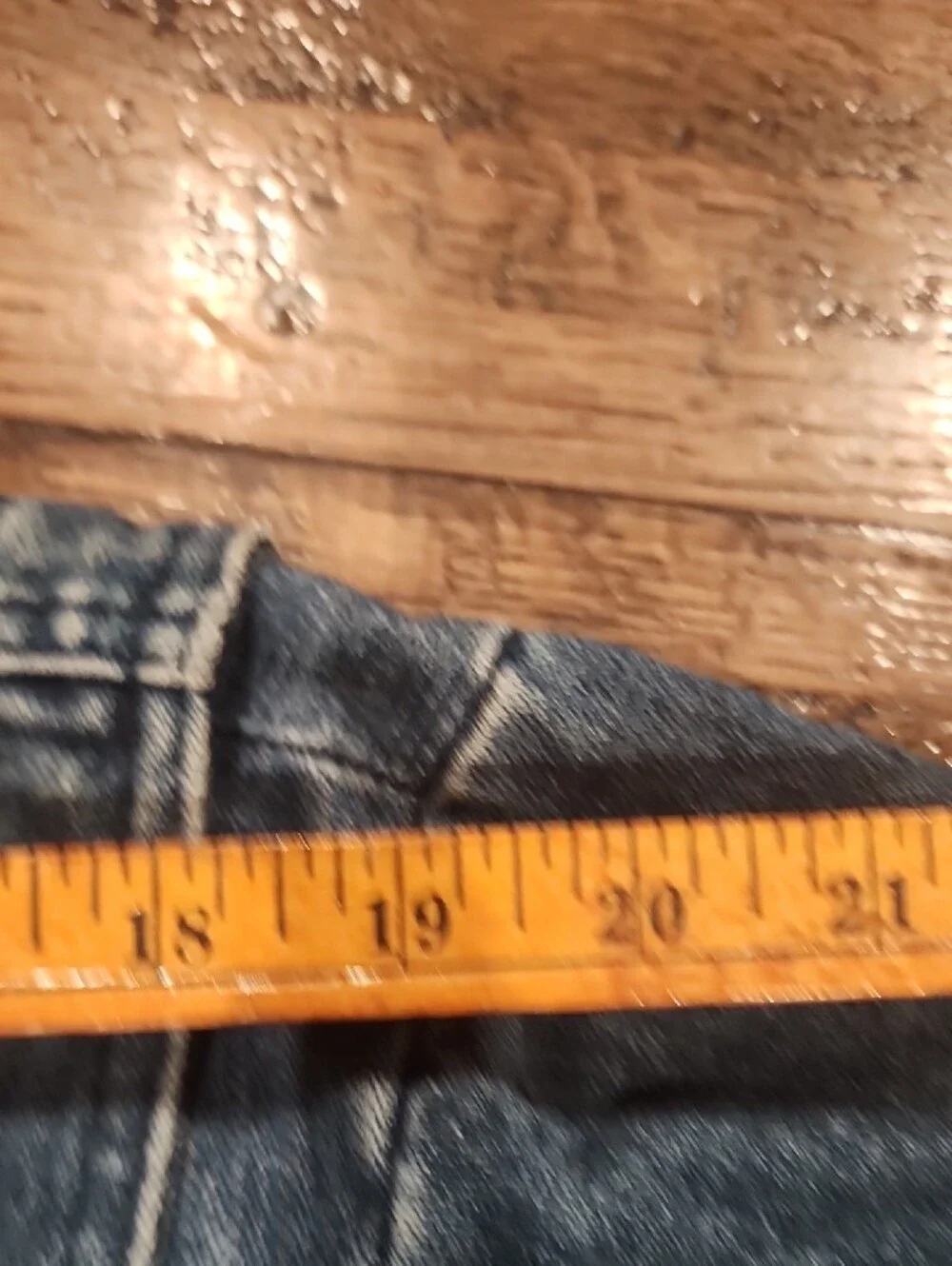 Vtg blue denim bomber jacket featuring a distinctive brown color